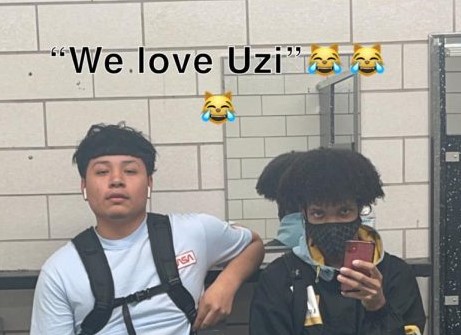 Students, Franklin Chavez and Christian Sellers listening to Lil Uzi.