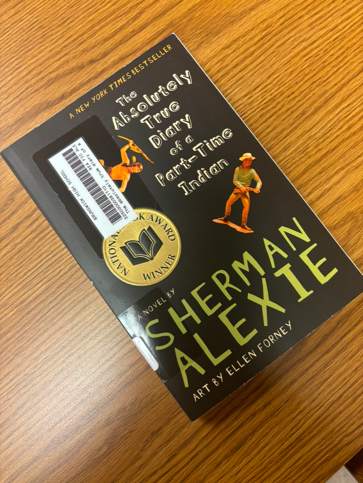 "The Absolutely True Diary of a Part-Time Indian" by Sherman Alexie.