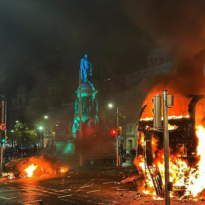 A double-decker bus set ablaze in front of the OConnell statue in Dublin, Ireland late Thursday night. 