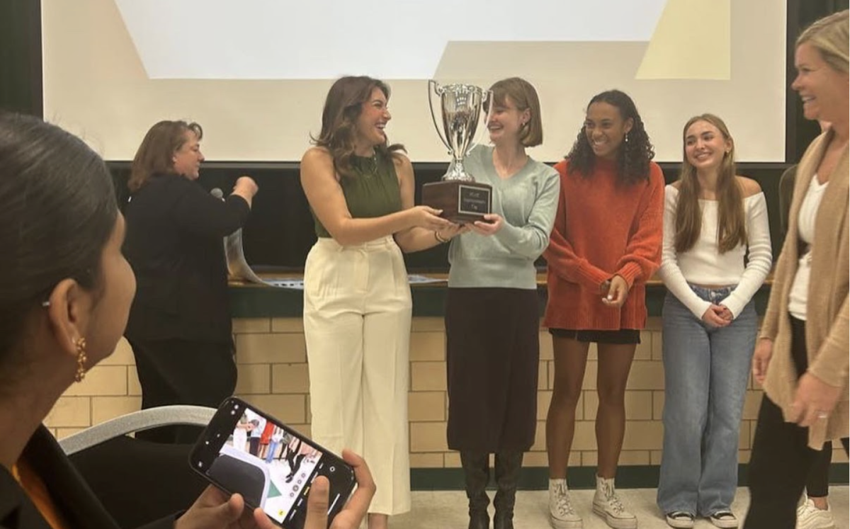 Keira McDonald (left) and Paige Trendell (right) receiving the Superintendents Cup. Photo credits to Maddie Eng. 