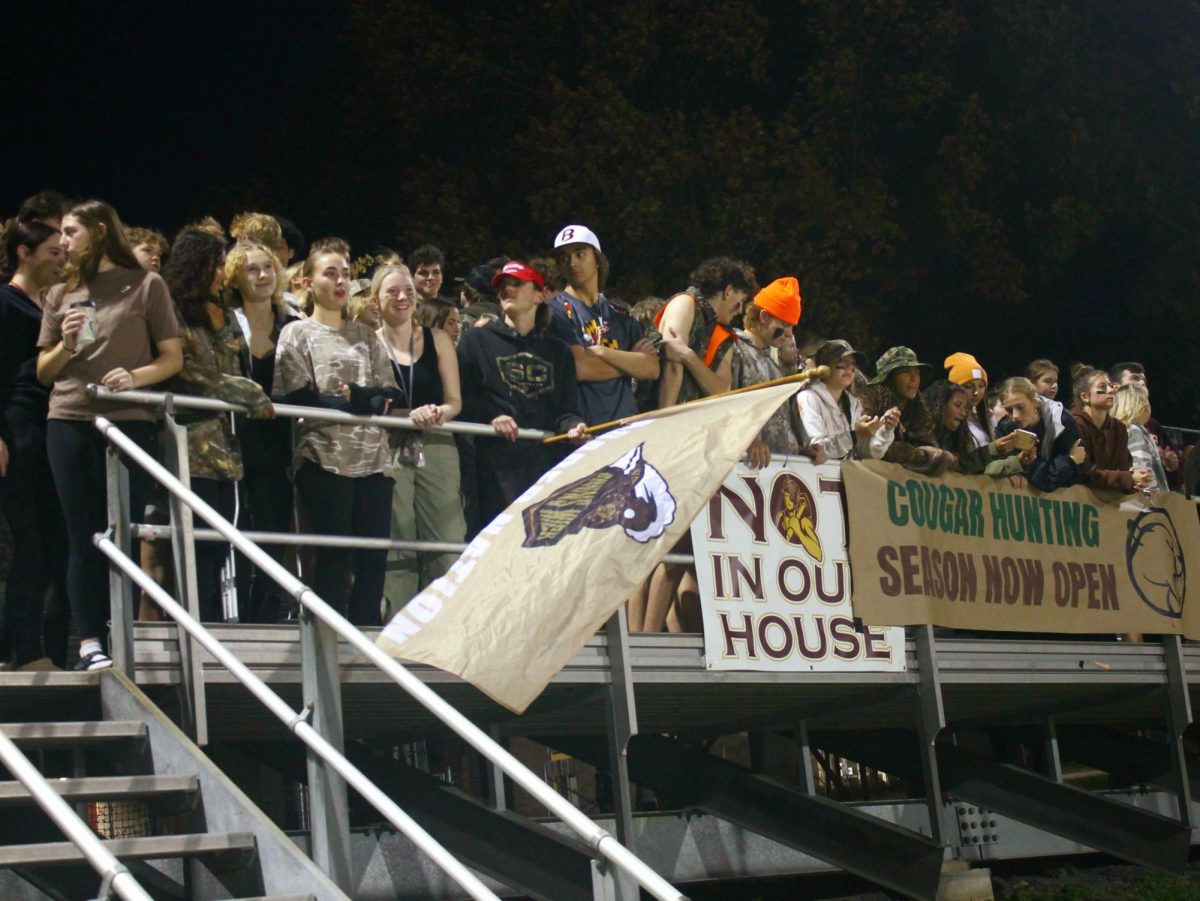 The student section is invested in the game.