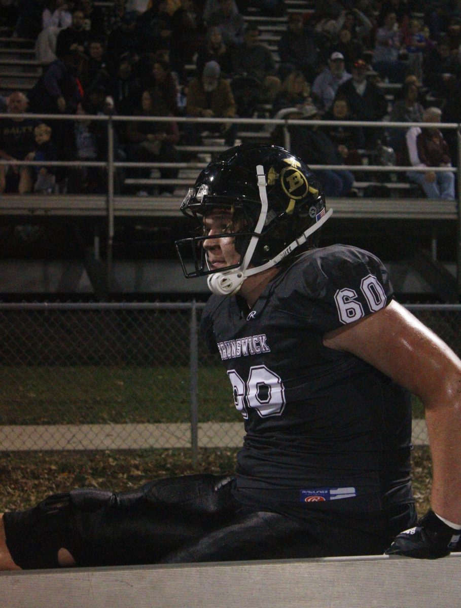 Jorden Moore (60), a sophomore gets ready for play.