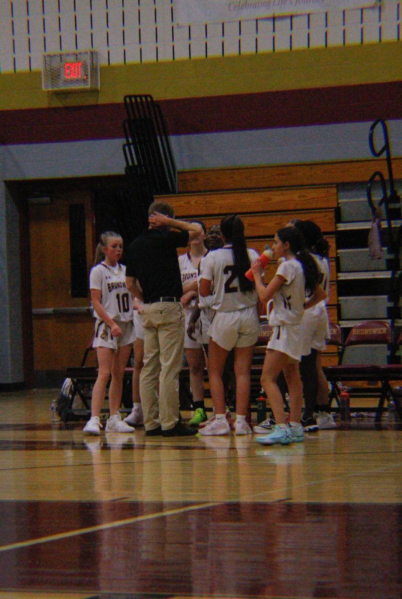 The final team huddle during the game.  