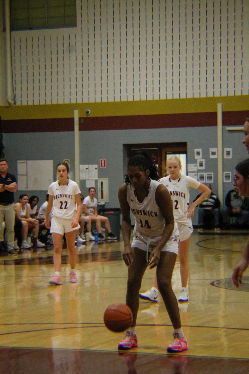 #14 Moya Nkong (Senior) takes a free throw. 