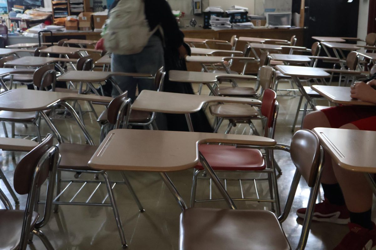 Crowded classroom, filled with desks to the brim