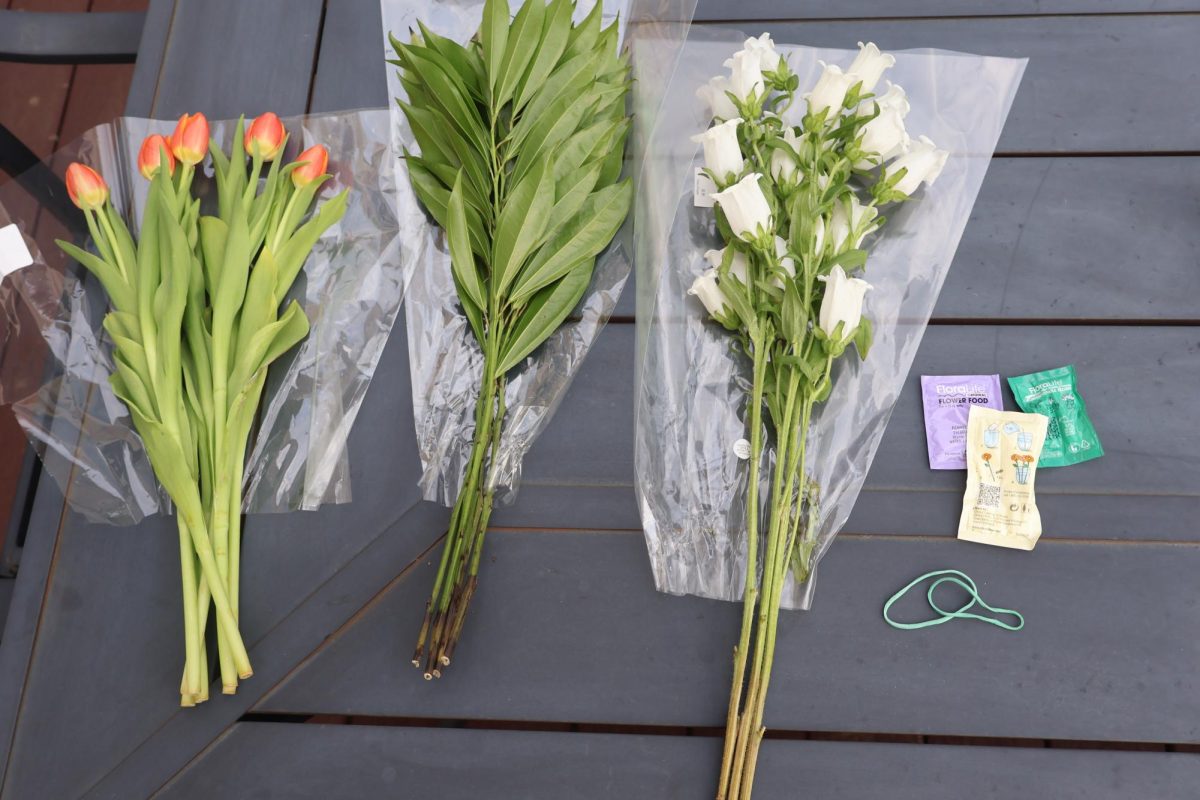 The first step is to open each flower and lay them out. It will help with setting up the flowers. Save the rubber band for later it will come in handy.