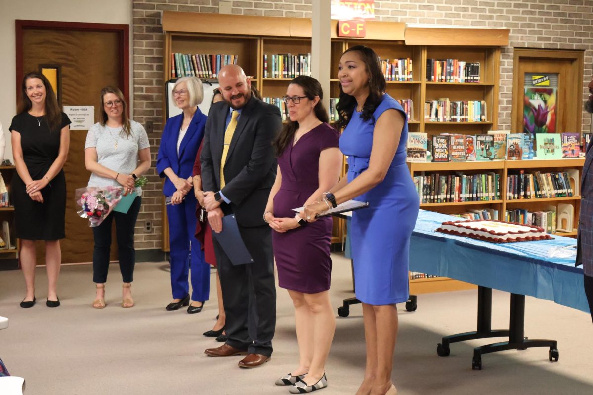 The superintendent came to deliver Ms. Kowalski's award ceremony.