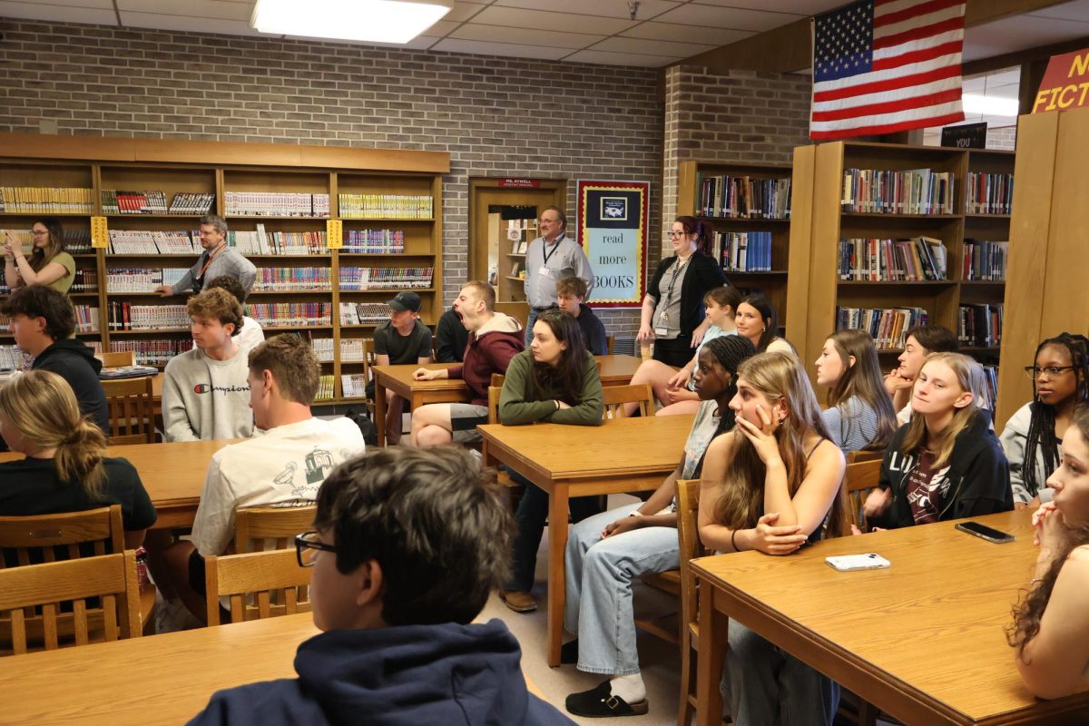 The students came down to celebrate with Ms. Kowalski