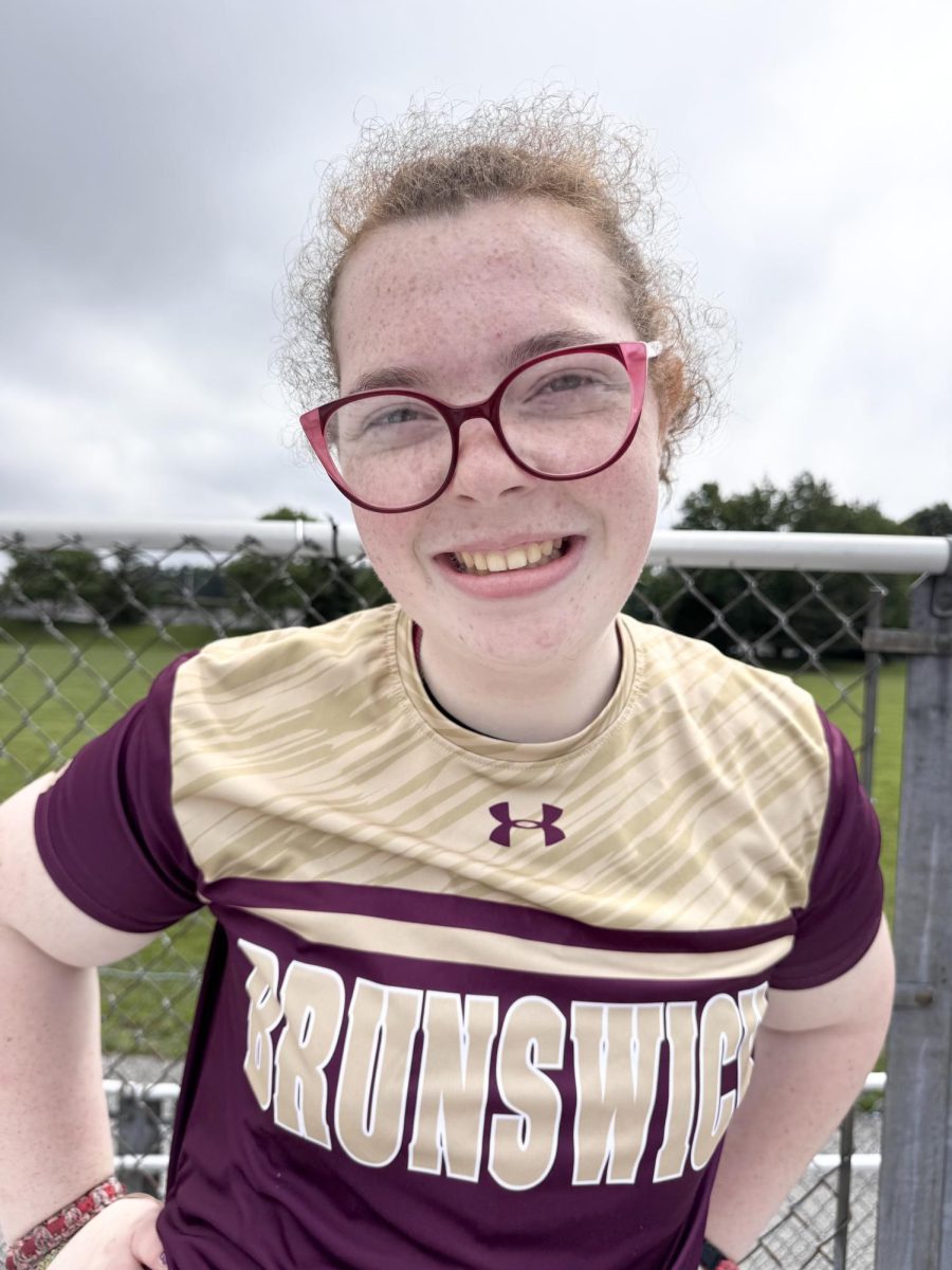 Emma at the Unified Track & Field State meet.