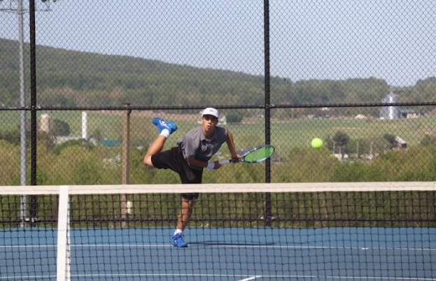 Ayden McDonald going for his powerful shot during his match!