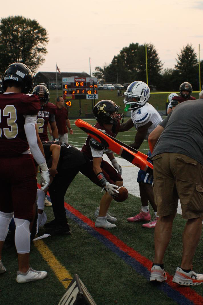 Sportsmanship shown between number 16, Cayden Boedecker and number 4 from Williamsport