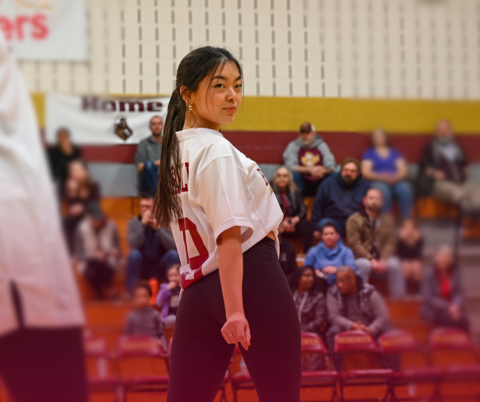 BHS Poms Captain, Phoebe Carpenter, senior, performing at a BHS Varsity Basketball game. Picture used with permission from Sofia Bonilla.