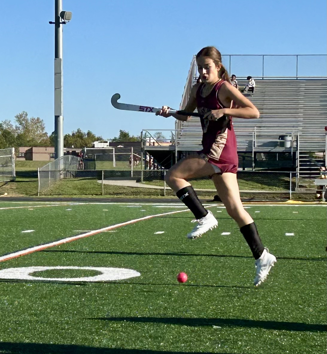 Emerson (Emme) Miller (sophomore) receives a ball played to her in last week's game against Frederick High.