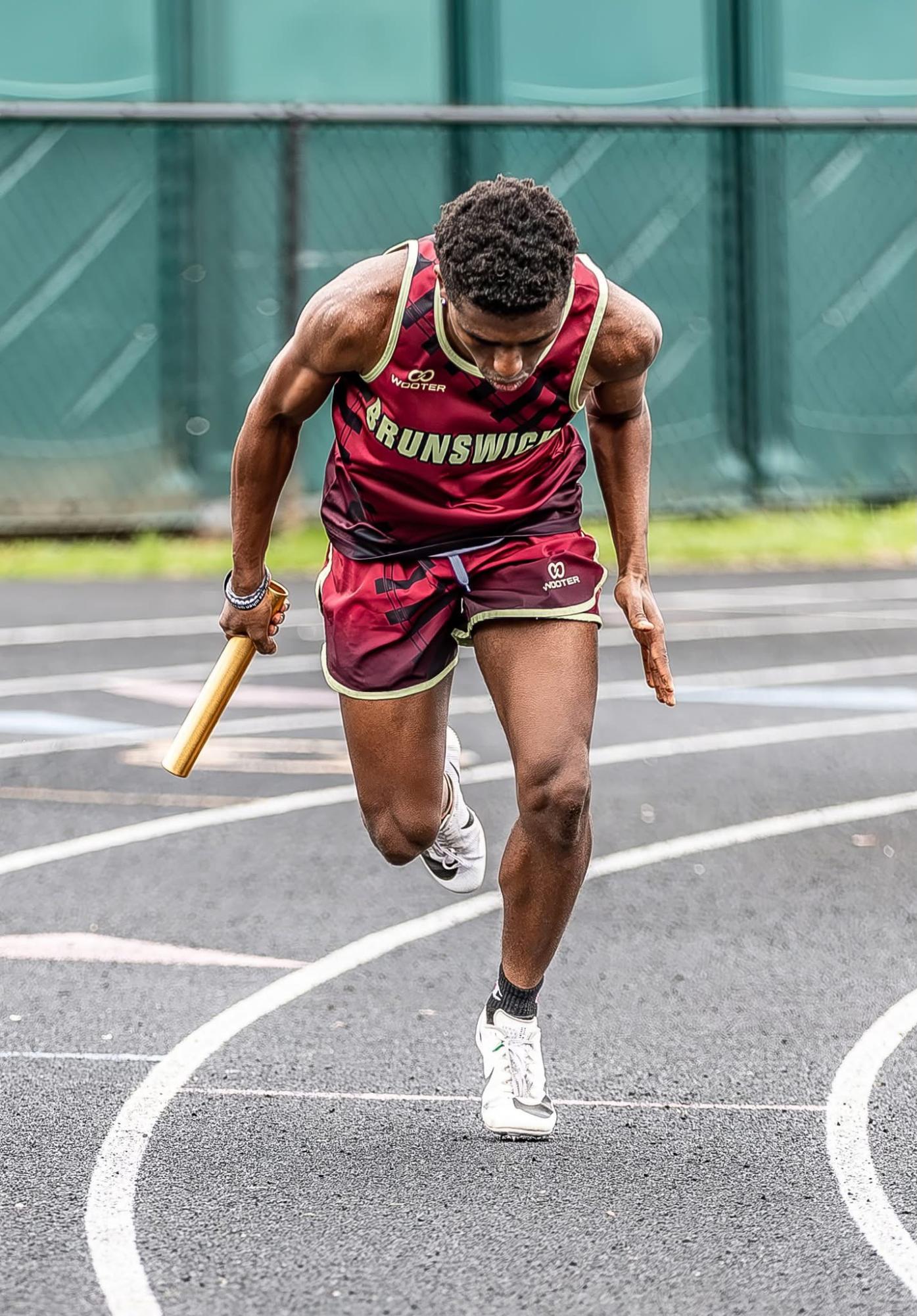 Josiah Nunez, senior, running in a 4x400 during a track meet.
Photo used with permission of Josiah Nunez.