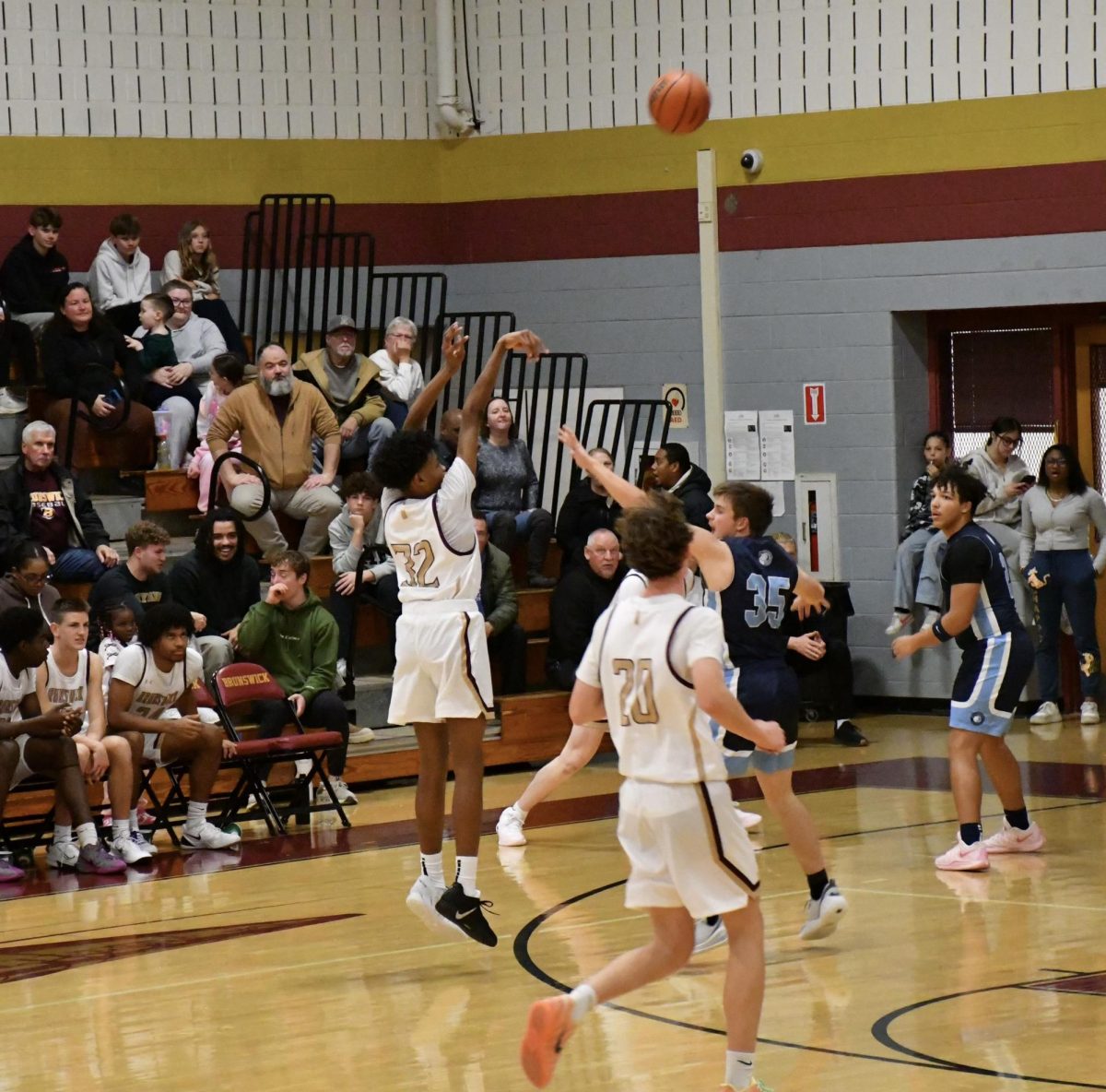 Jaivyn Moody, '29, shooting a three-pointer.

Photo taken by Lindsey Pearre
