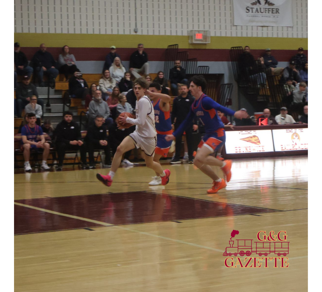 Nick Martinis driving to the basket on a fast break.