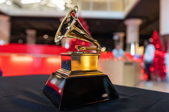 A Grammy Award on a table.

Photo taken from creative commons