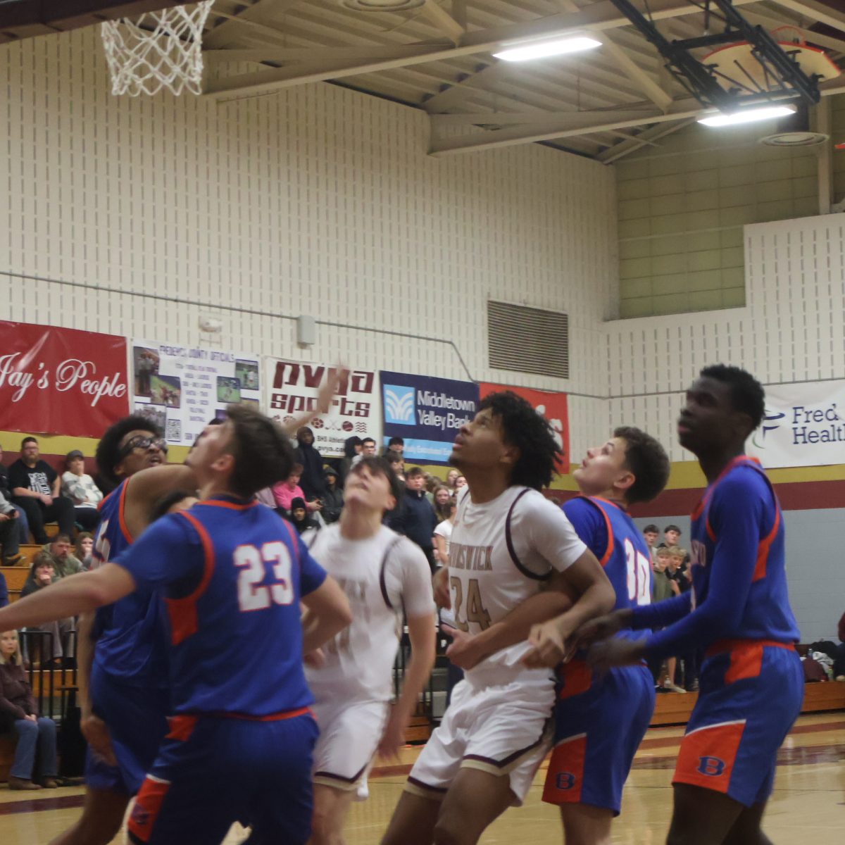 Brunswick players try to get a rebound in the Boonsboro game advancing to the semi-finals for playoffs.