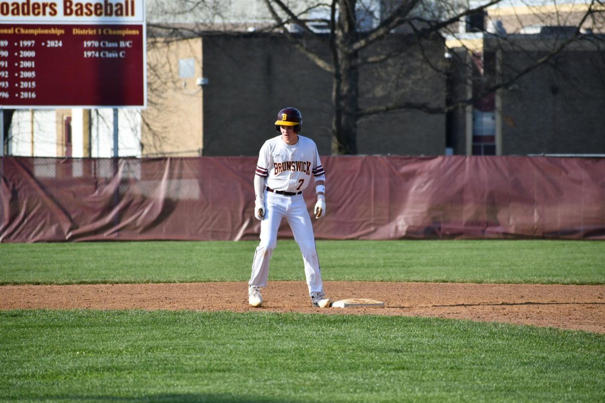 Dylan Murphy standing at second base after a hit in hopes to go to third.