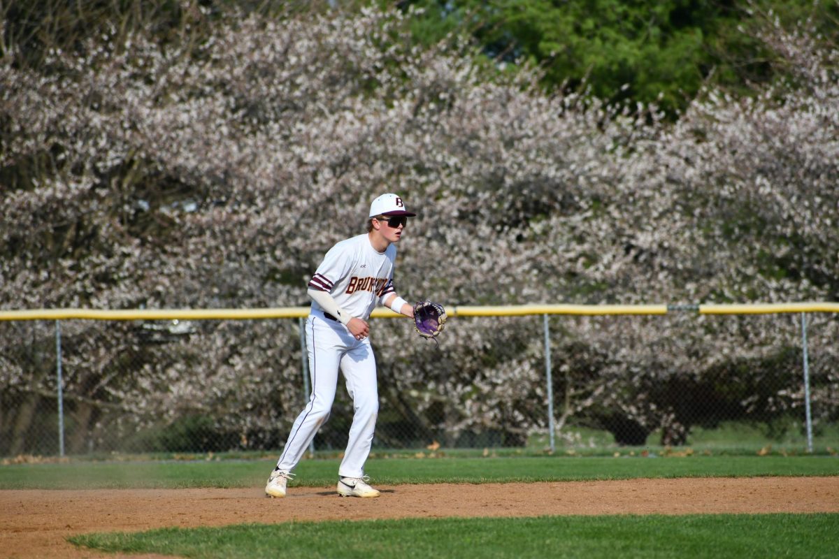 Dylan Murphy gets ready in the infield at the start of the inning. 