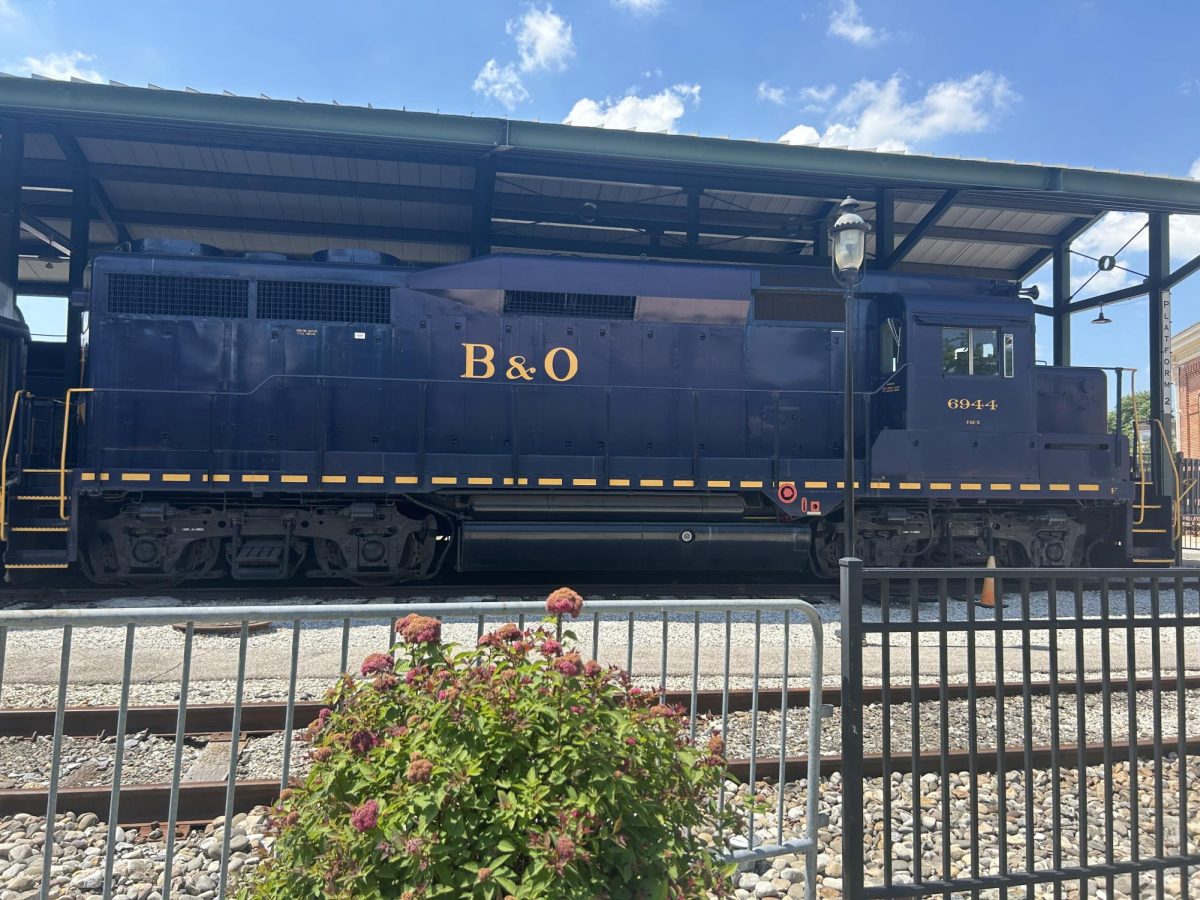 A Baltimore & Ohio Railroad Electro Motive Division GP30 locomotive sits idle ready to pull the mile 1 express train.