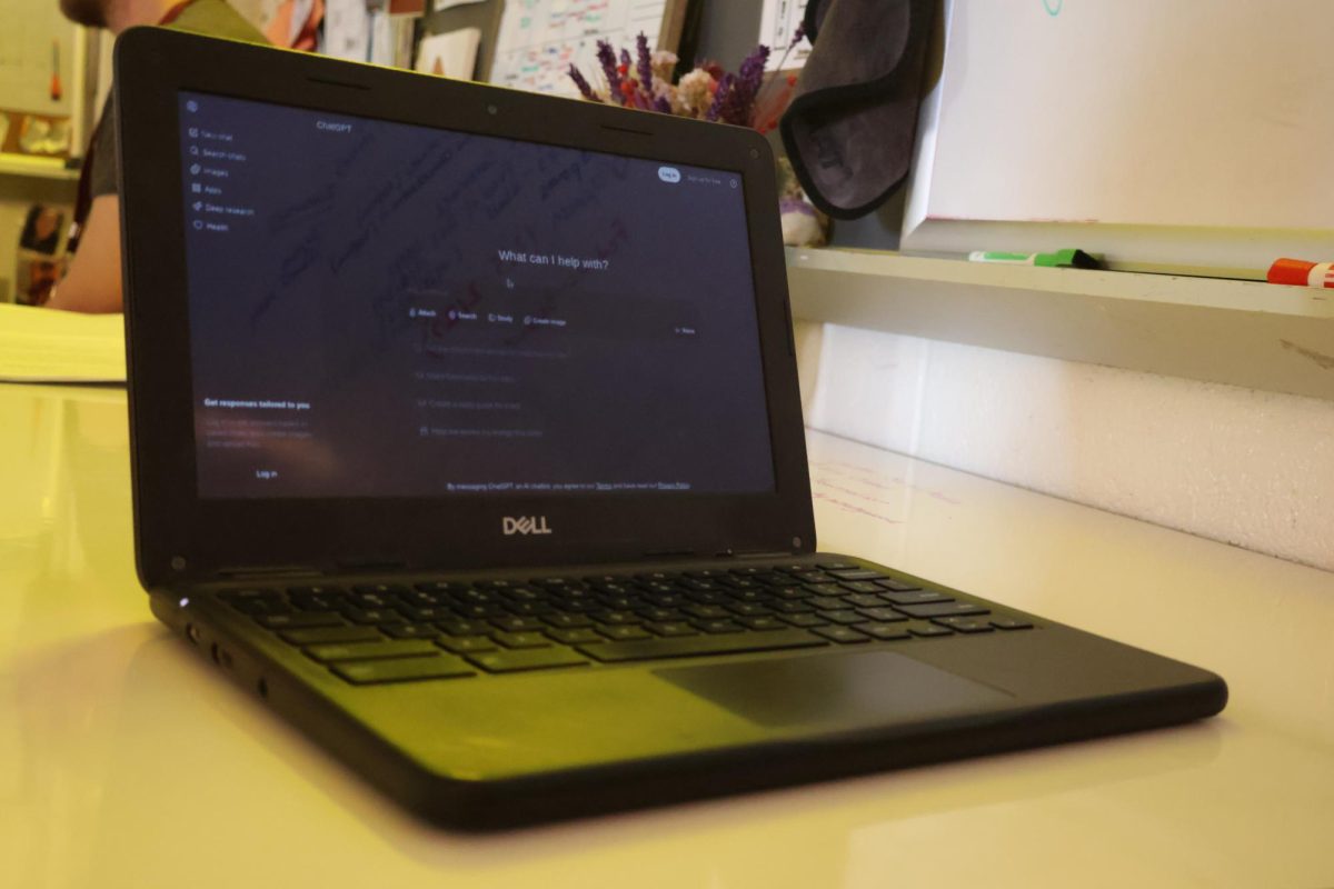 ChatGPT a known AI chat bot on a small laptop.