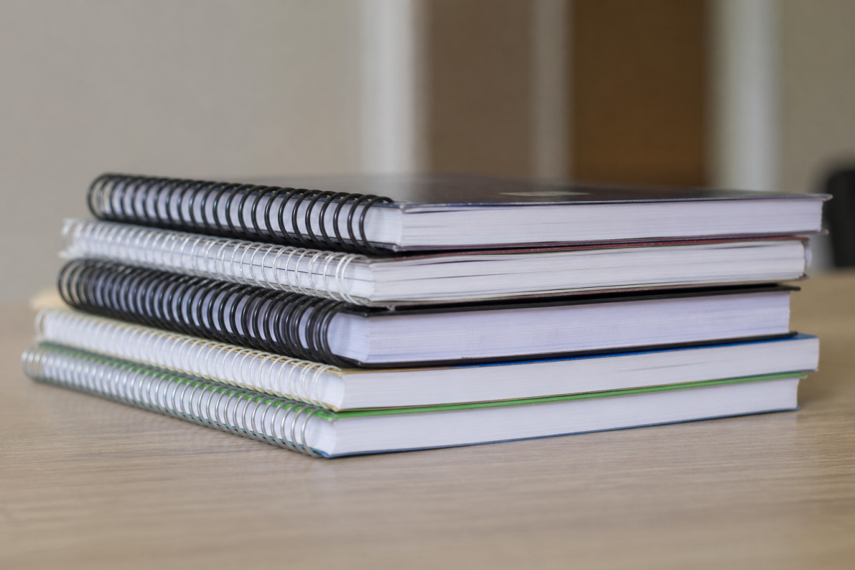 Life piles on, as a stack of books, just like some sophomores feel in the "slump" of life.