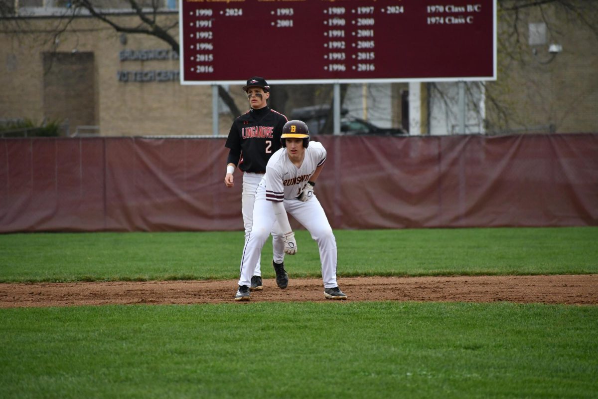 #14, Logan Lowery, sophomore, ready to run bases.