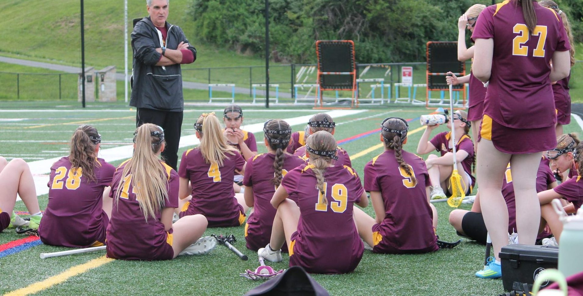 The Brunswick girls lacrosse team at halftime for their first playoff game in Catoctin.