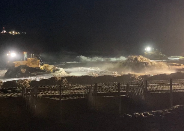 Beach nourishment occurs on the beach in Avon, North Carolina, in 2022.